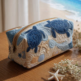 Anaïs - Trousse de toilette matelassée Coquillages Bleu Ciel