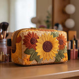 Inès - Trousse de toilette matelassée Détail Joyeux