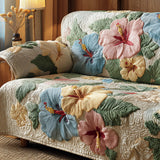 Mahaut - Housse de canapé matelassée Hibiscus
